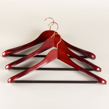 Suit and jacket hanger - mahogany with trouser bar
