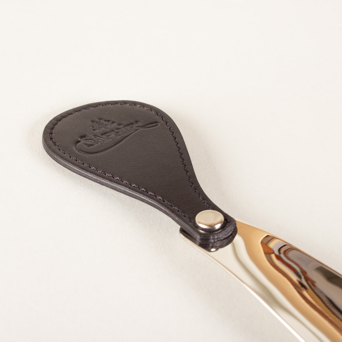 La Cordonnerie Anglaise Black leather and metal shoe horn